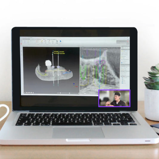 MacBook Pro computer with an image of digital dental implant planning software on the screen and Dr. Jonathan Ng in the lower right corner explaining to a virtual audience through a Zoom meeting
